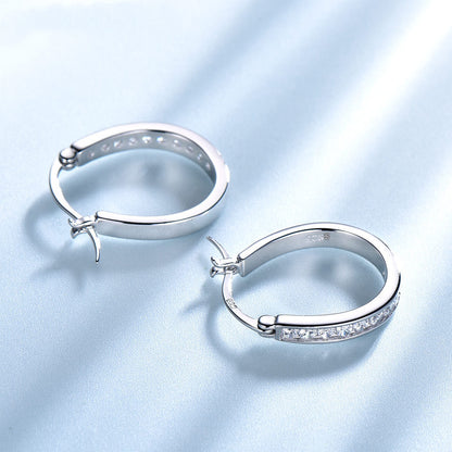 Brilliant silver hoop earrings with zirconium crystals