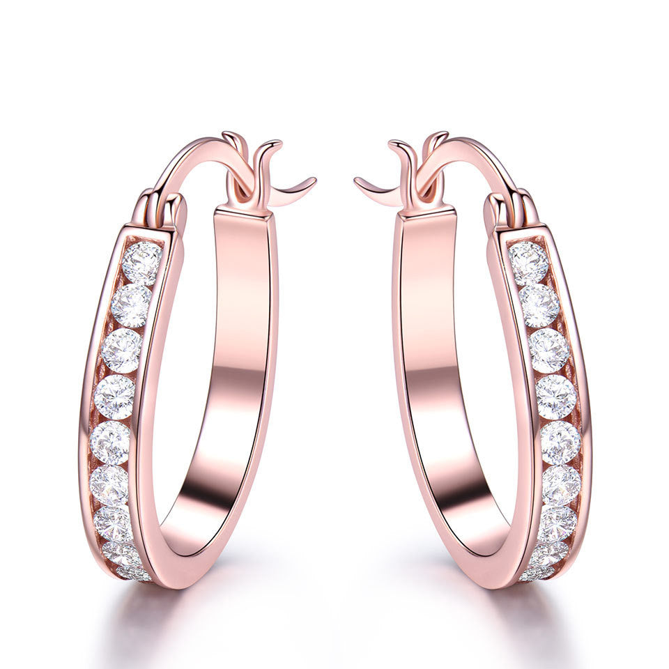 Brilliant silver hoop earrings with zirconium crystals