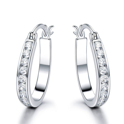 Brilliant silver hoop earrings with zirconium crystals