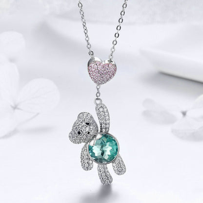 Silver necklace with sparkling teddy bear pendant